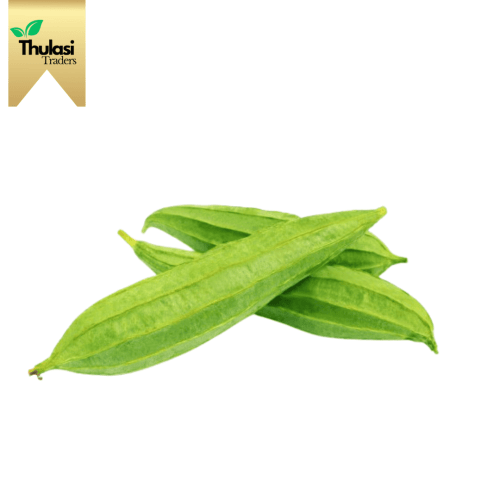 Fresh Ridge Gourd - Locally sourced vegetable by Thulasi Traders. Perfect for enhancing culinary creations with mild and nutritious goodness.